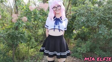 Sexy schoolgirl with ears in uniform walks down the abandoned road
